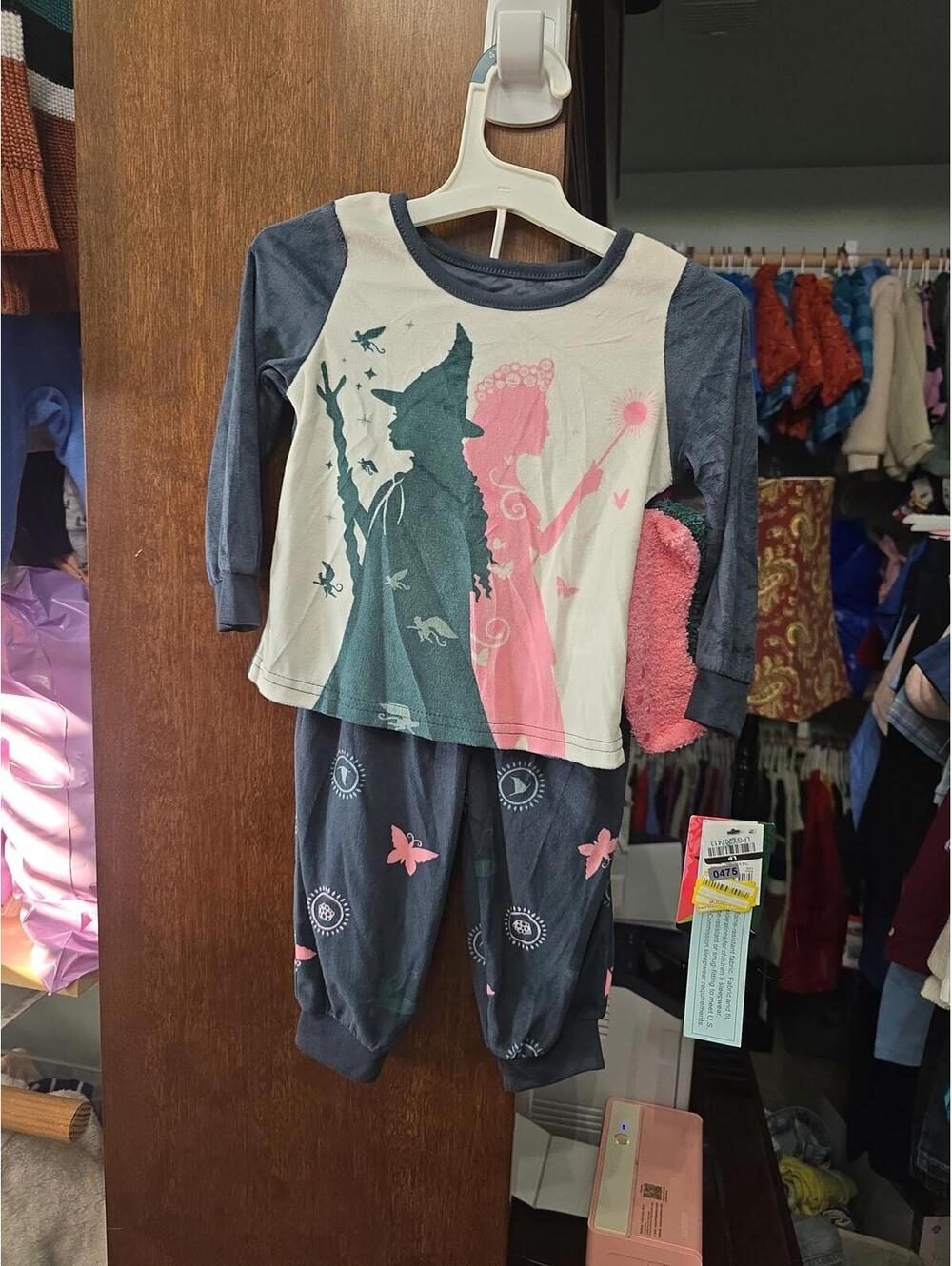 2t brand new wicked pajamas with socks.Item 475
